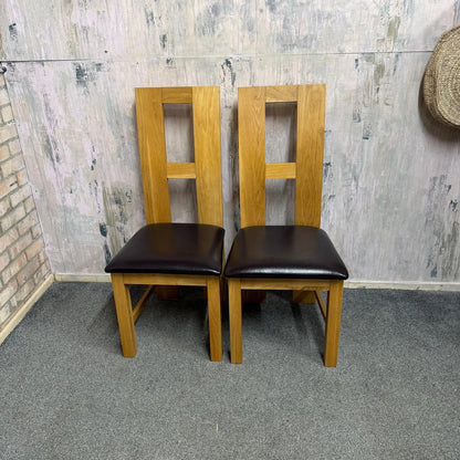 2 Solid Wood Dining Chairs Brown Leather Seats Sturdy Open Design Back