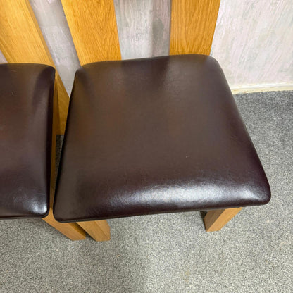 2 Solid Wood Dining Chairs Brown Leather Seats Sturdy Open Design Back