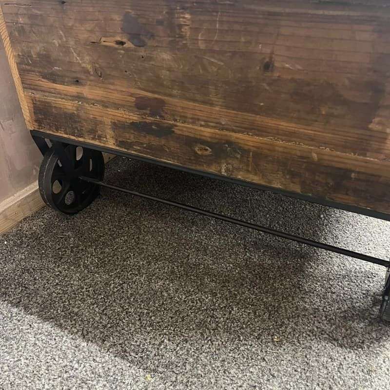 Wooden Plank Topped Trolley Coffee Table Black Metal Wheels Vintage Look