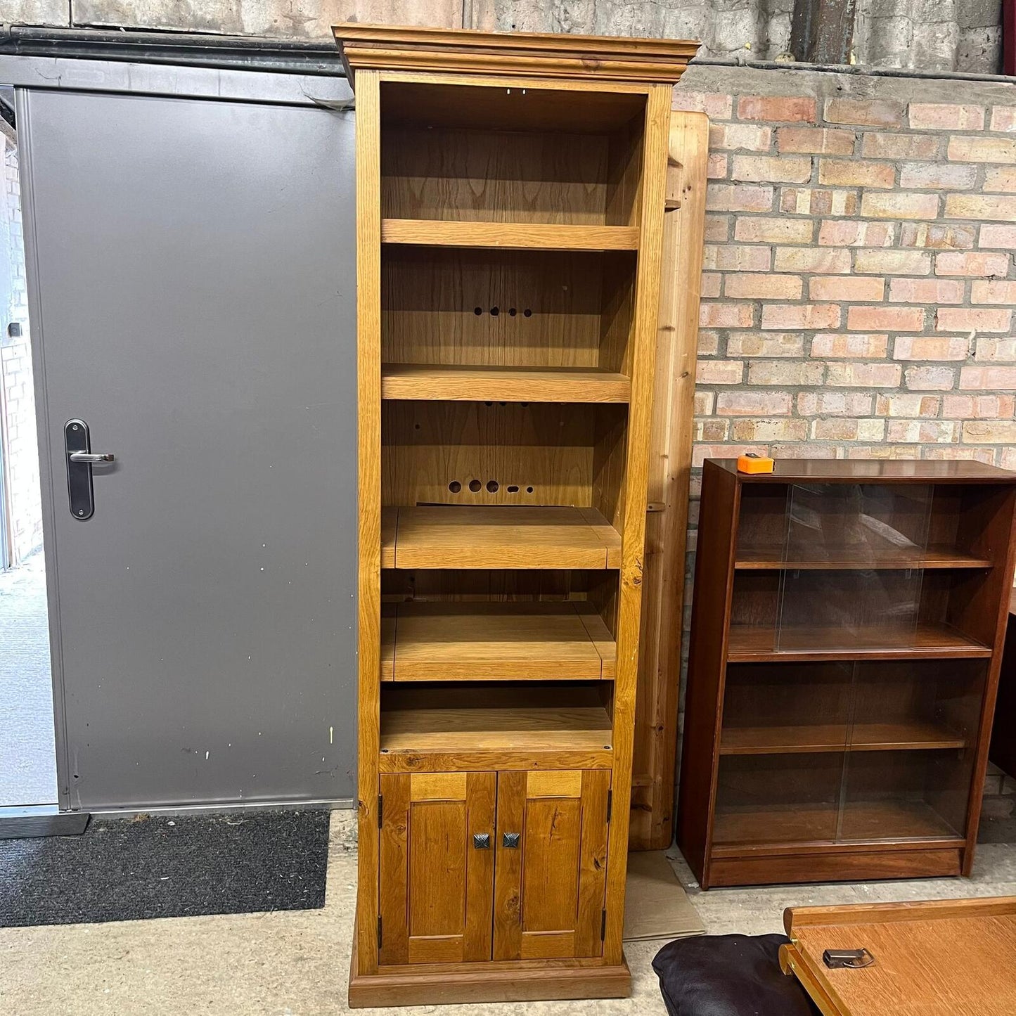 Tall Narrow Oak Entertainment Media Unit Adjustable Shelves Over Double Cupboard