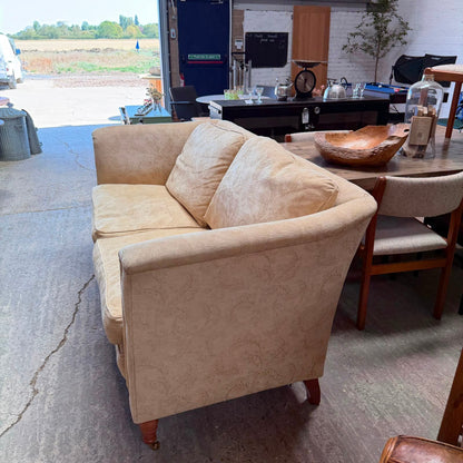 Large High Arm 3 Seater Sofa Warm Cream Floral Design Front Castors Stowe Design