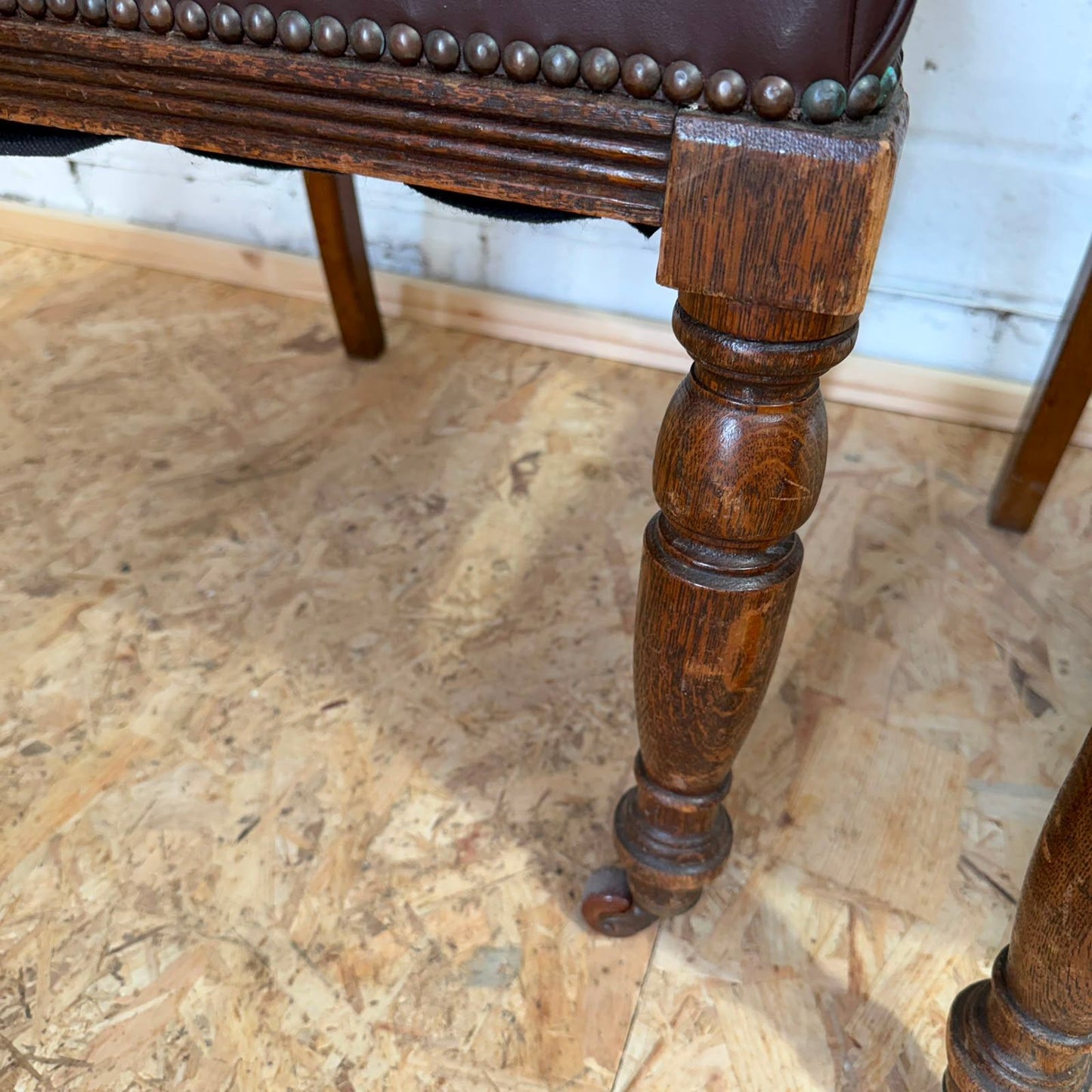 Pair Edwardian? Jacobean Style Dining Chairs Leather Seats Carved Backs Castors