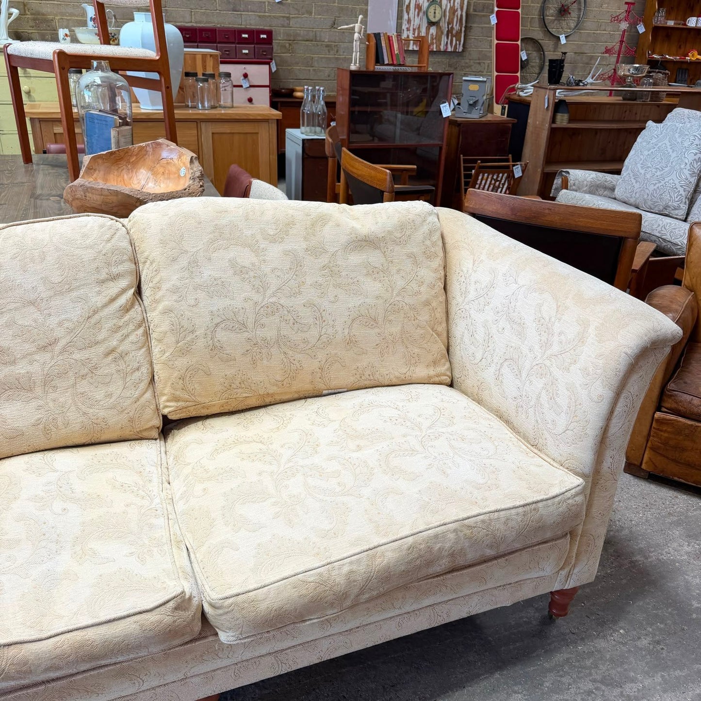 Large High Arm 3 Seater Sofa Warm Cream Floral Design Front Castors Stowe Design