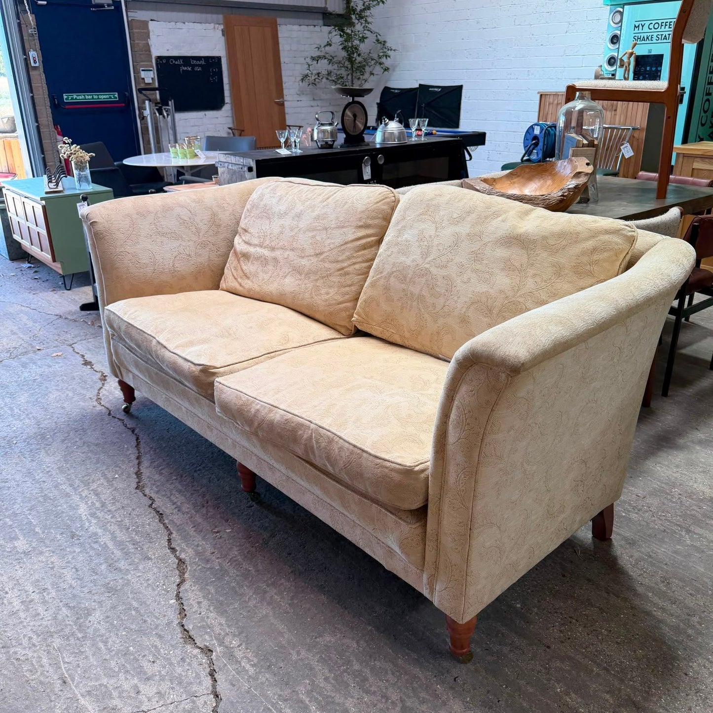 Large High Arm 3 Seater Sofa Warm Cream Floral Design Front Castors Stowe Design
