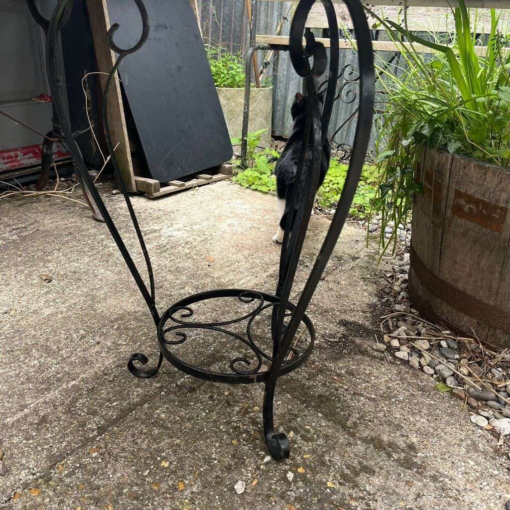 Black Metal Circular Garden Table Faded Clock Face Tripod Legs Ornate Shelf